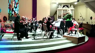 orchestra playing highland holiday